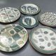 Set of 5 artisanal plates in enamelled earth plus a dessert plate. Unique pieces .