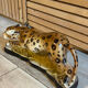 Vintage decorative ceramic sculpture representing a leopard.