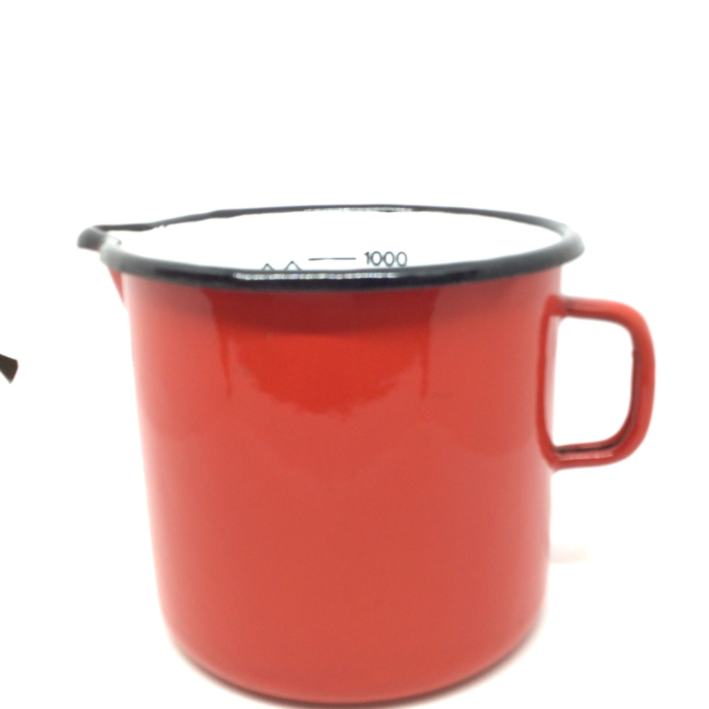 Red pitcher in enamelled metal