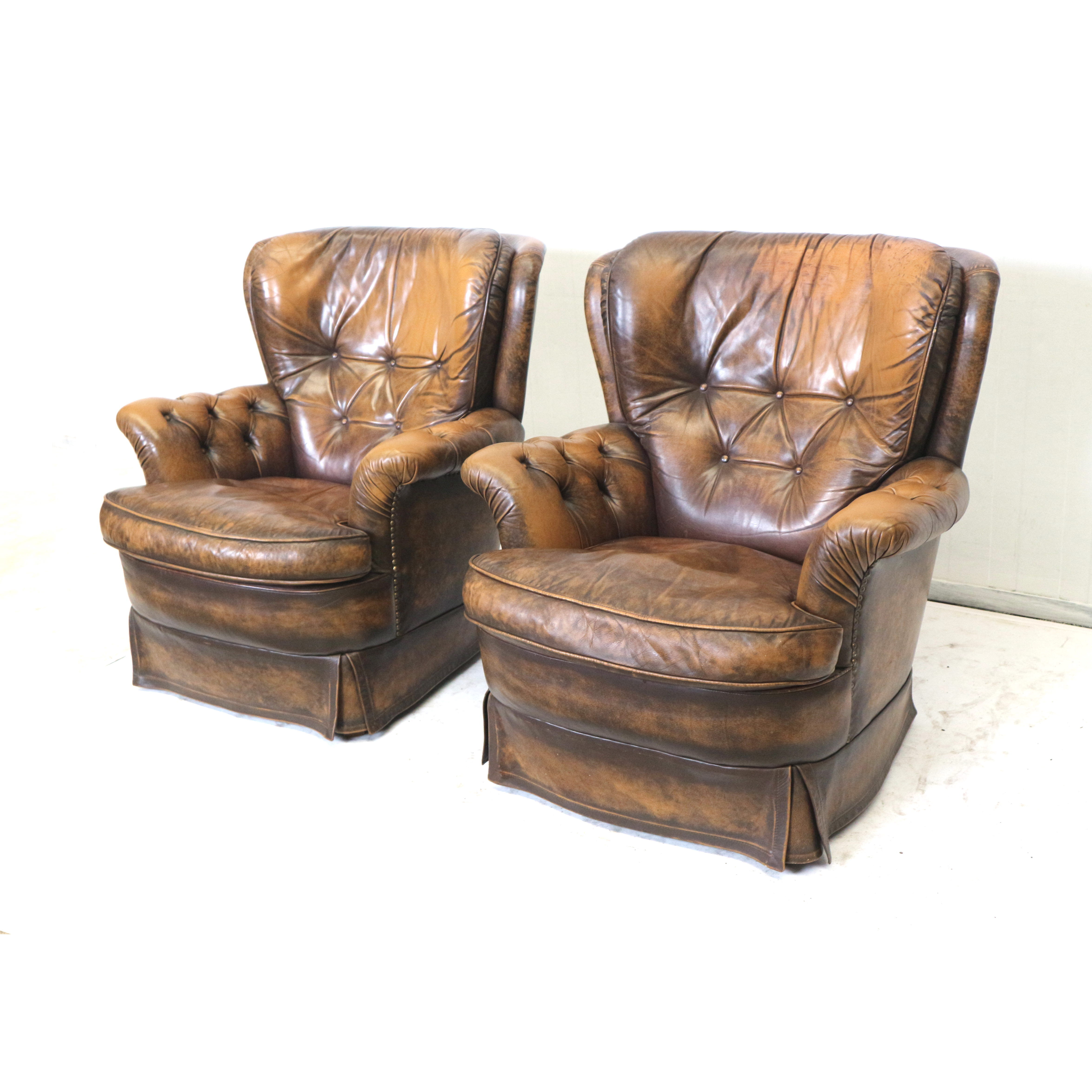 Set of 2 leather armchairs from the 1970s