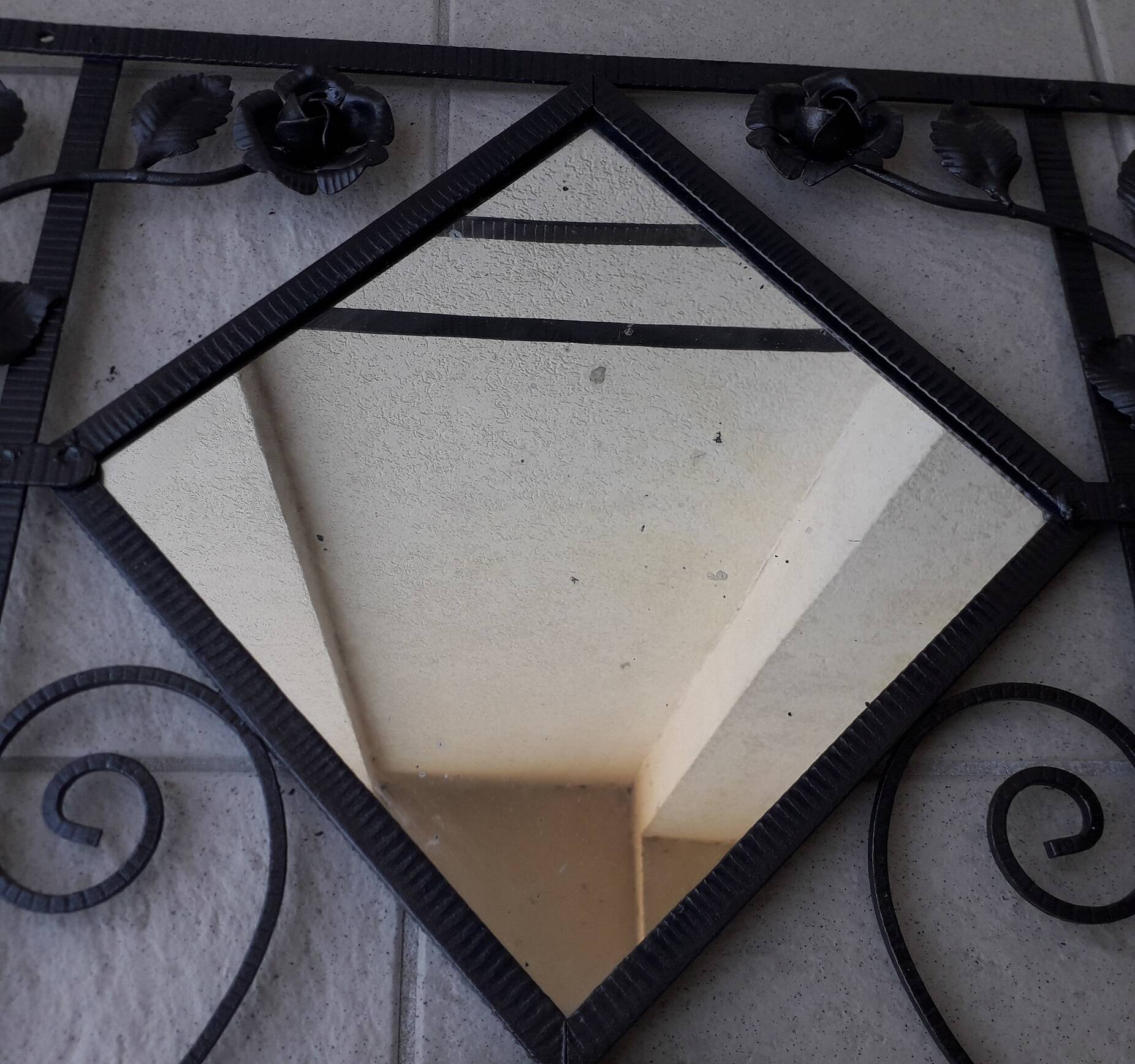 Wrought iron coat rack
