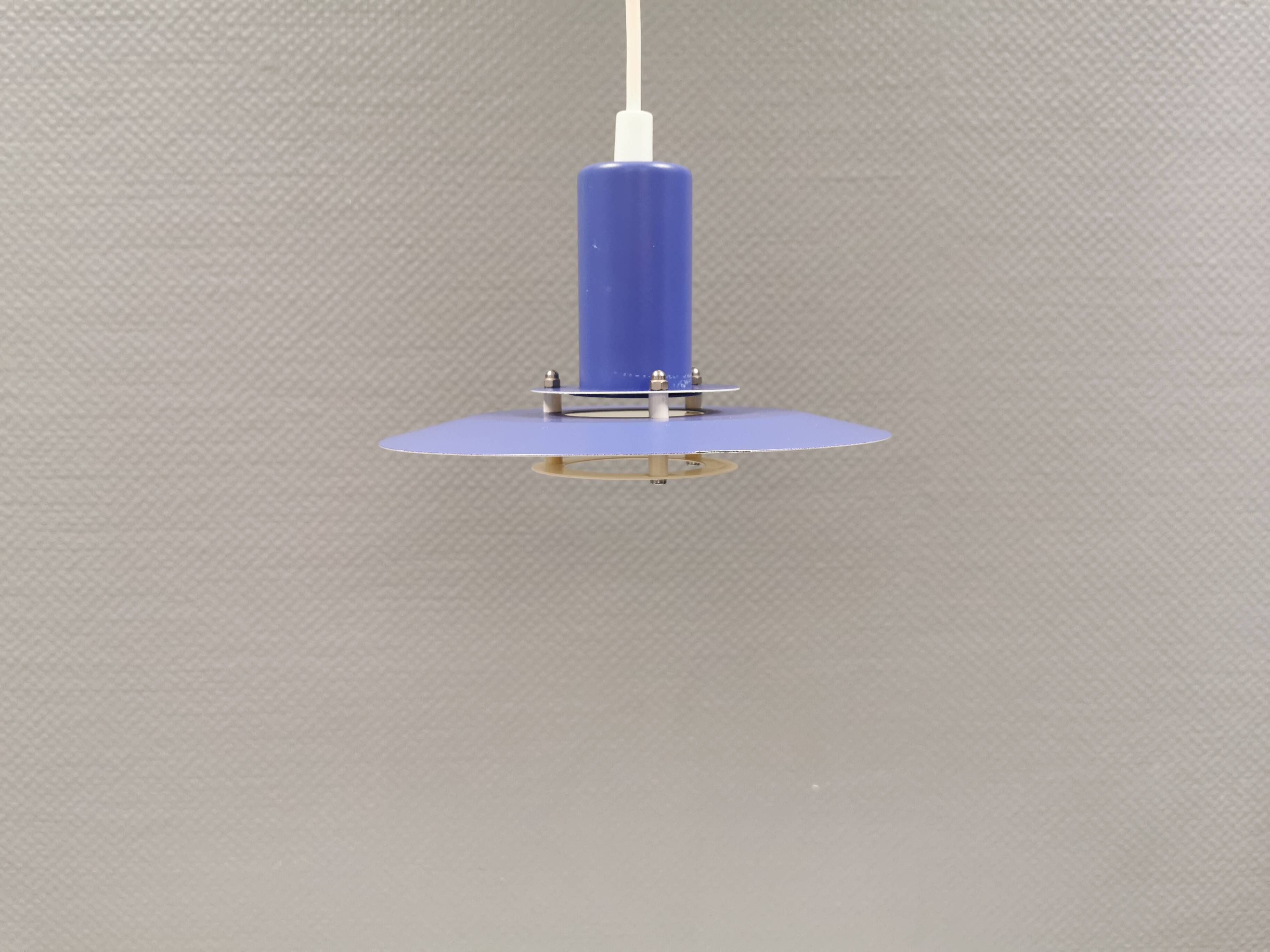 A blue minimalist hanging lamp from Lyfa Denmark 1980s.