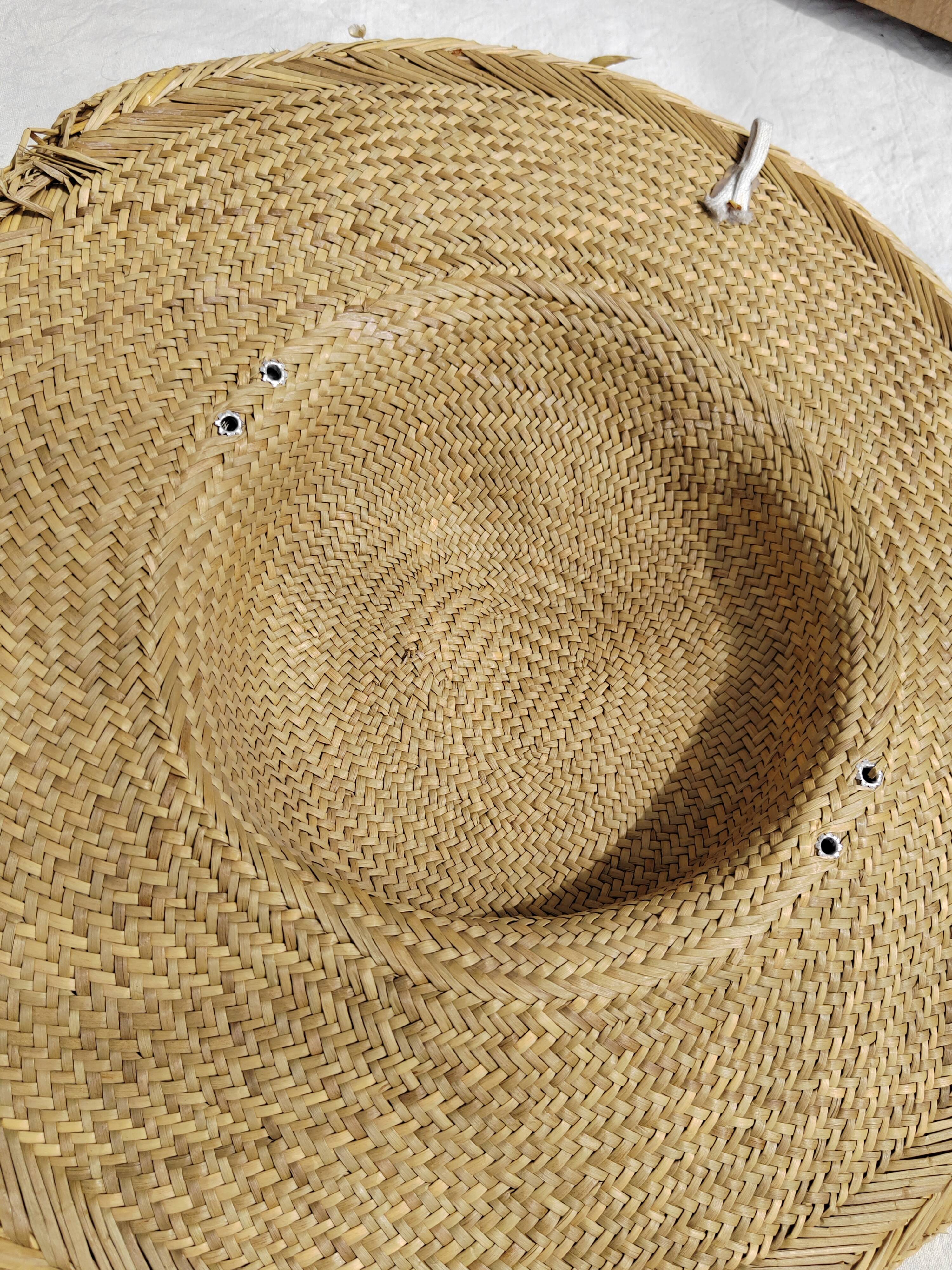 Decorative straw hat with dried flowers