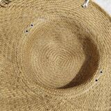 Decorative straw hat with dried flowers