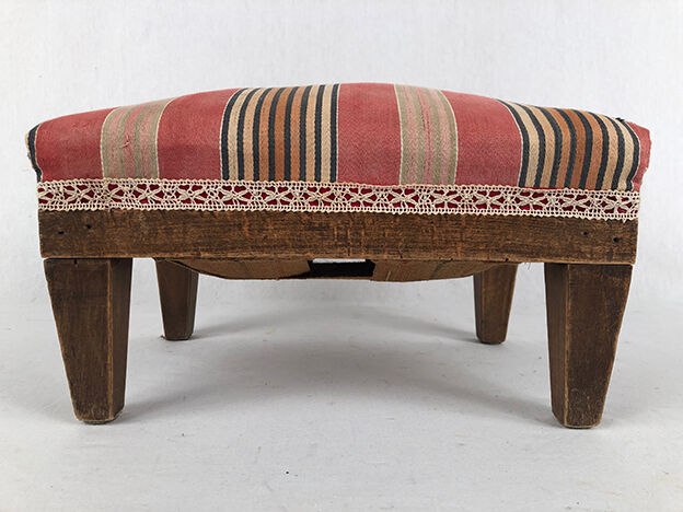 Footrest in natural wood trimmed with striped fabric