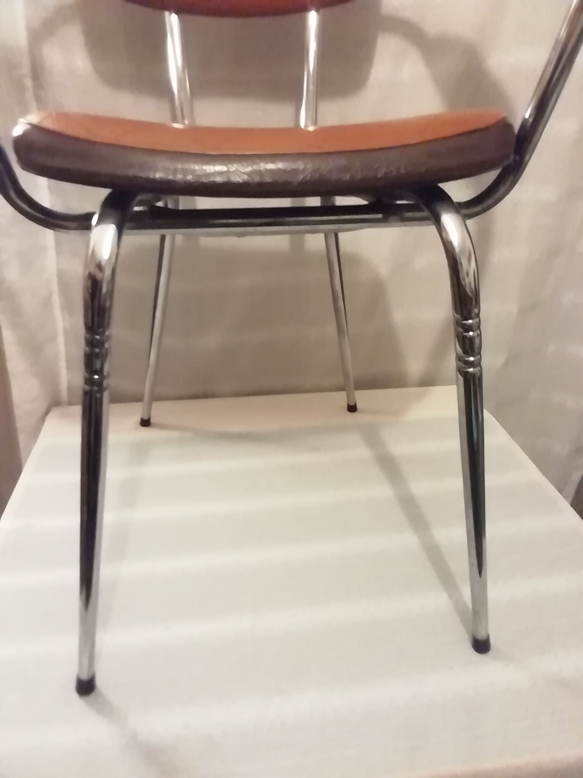 2 skaï chairs and vintage chrome