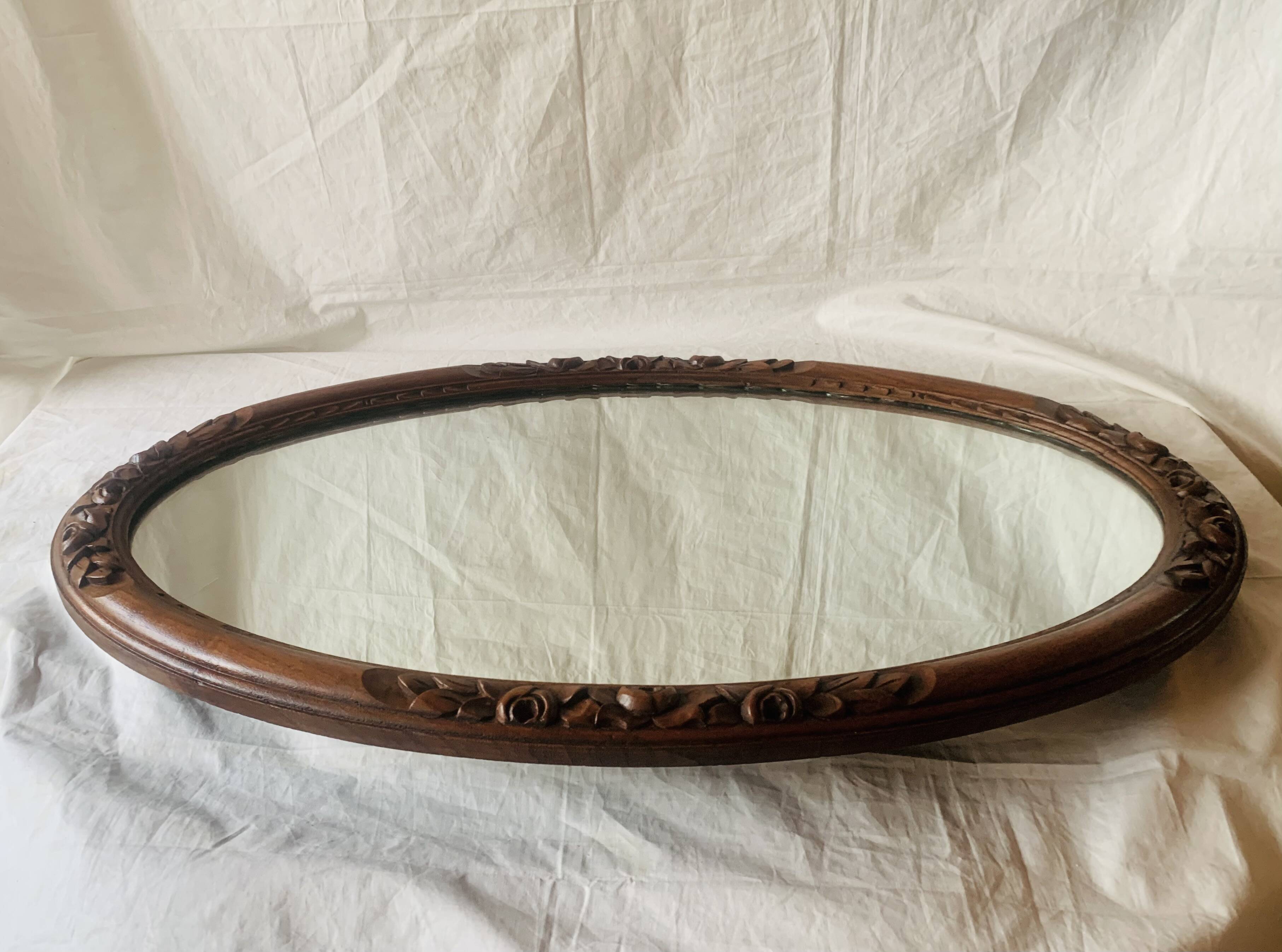 Large Art Deco oval mirror in carved wood - 87 x 53 cm