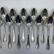 Set of 12 soup spoons and 6 silver-plated lunch forks.