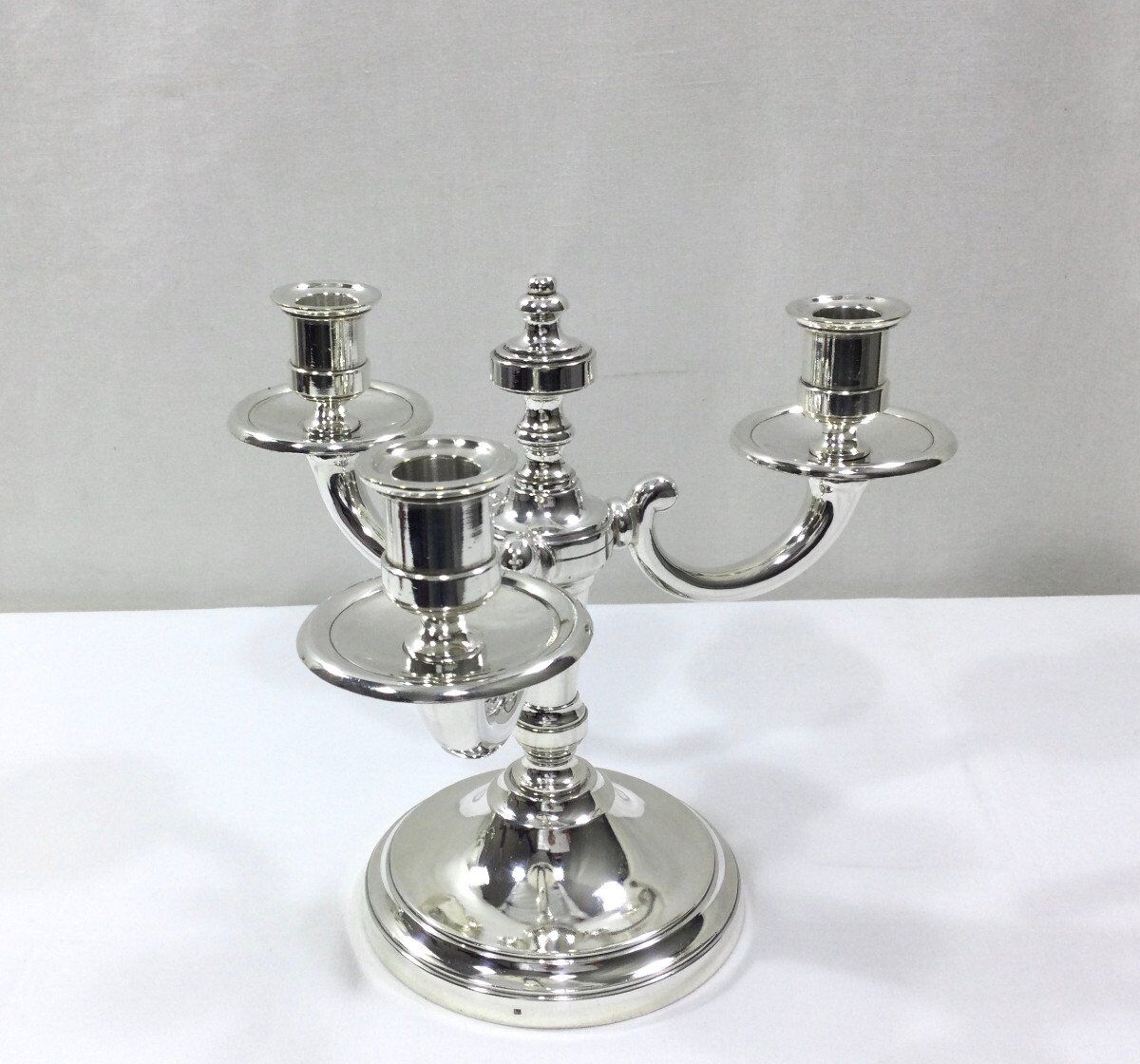 Pair of silver bronze candelabras