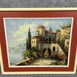 Italian School: painting of a castle on the edge of a lake