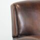 Beautifully shaped vintage sheepskin armchair with character