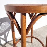 Old low caned bistro stool