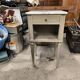 Vintage green patinated bedside table with marble and drawer