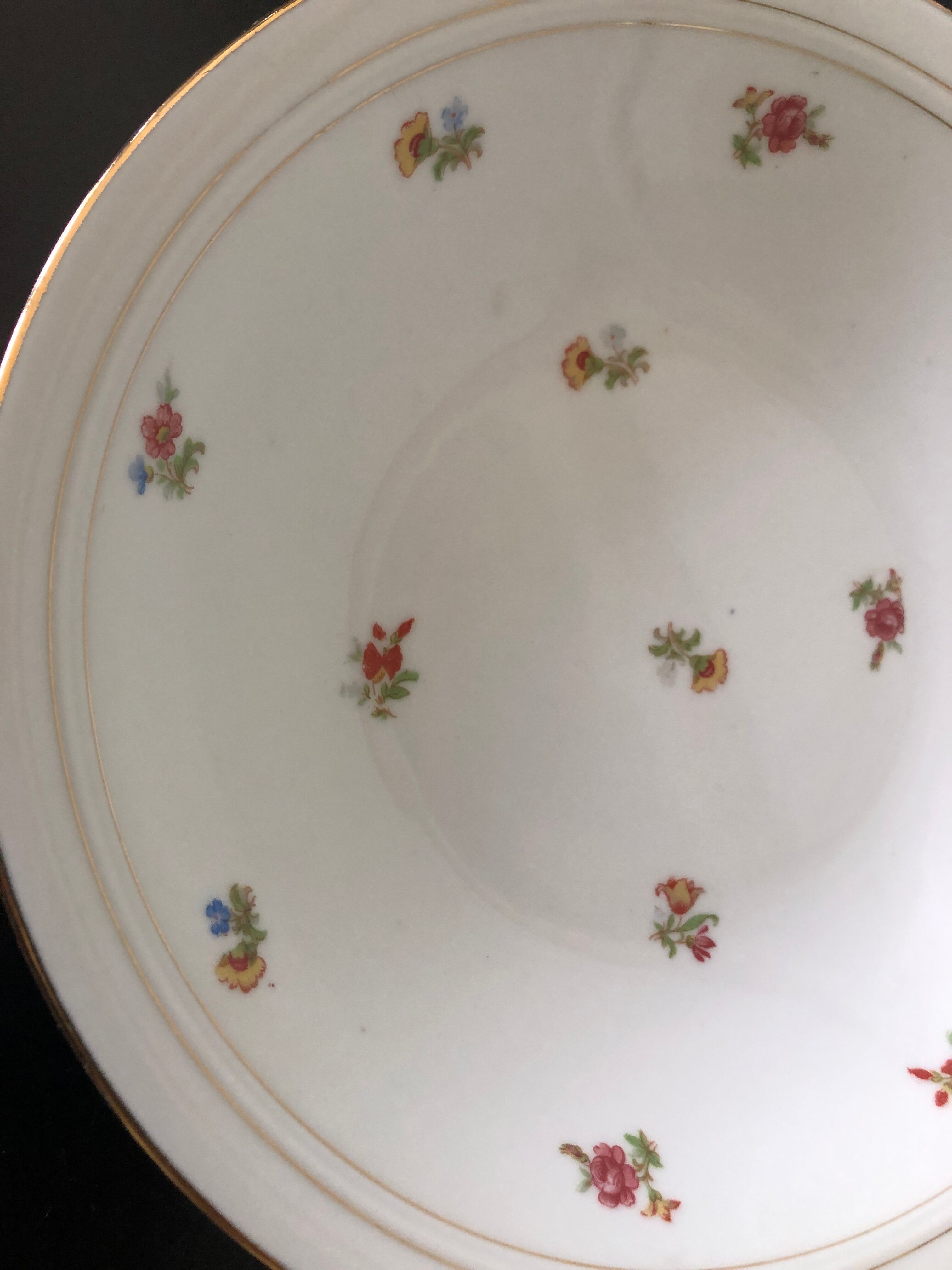 Composition in gilded earthenware