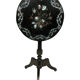 Napoleon III tipping pedestal table, blackened wood burgauté of mother-of-pearl