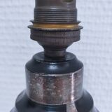 Art Deco metal lamp base with black and silver patina