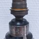 Art Deco metal lamp base with black and silver patina
