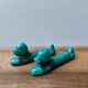 Set of two vintage zoomorphic dog-shaped knife rests in green Vallauris A.