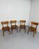 Set of 4 vintage solid oak chairs, 1960s design with sculpted backrest.