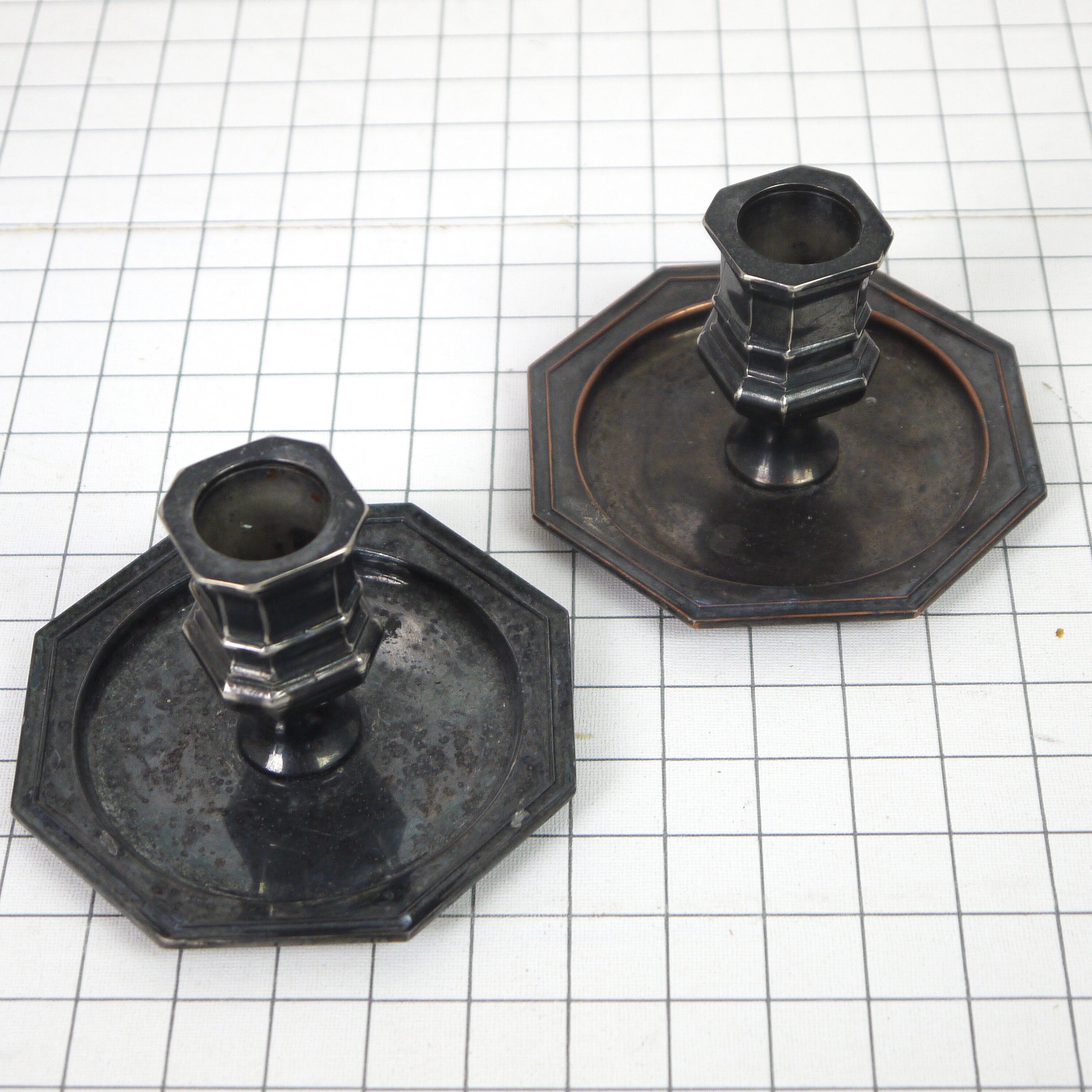 Pair of metal candlesticks