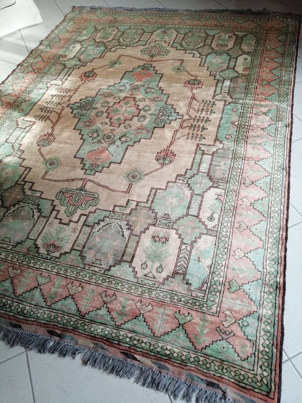 Afghan rug in pastel colors