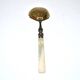 Empire sprinkling spoon in gilded silver vermeil and mother-of-pearl, 19th century.