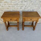 Pair of solid oak bedside tables with carved legs