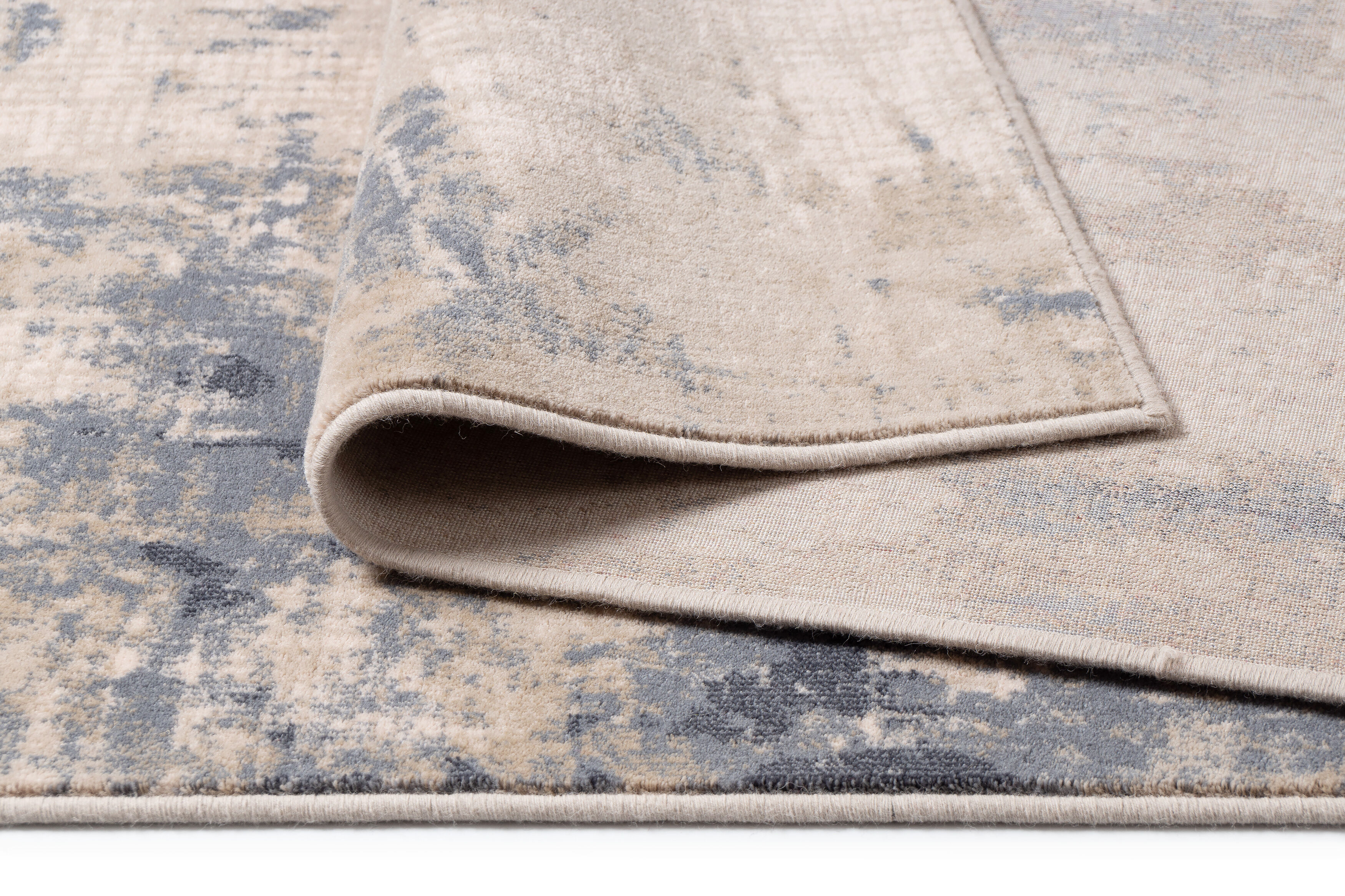 Tapis en laine abstrait beige et bleu