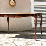 Solid wood table with curved legs
