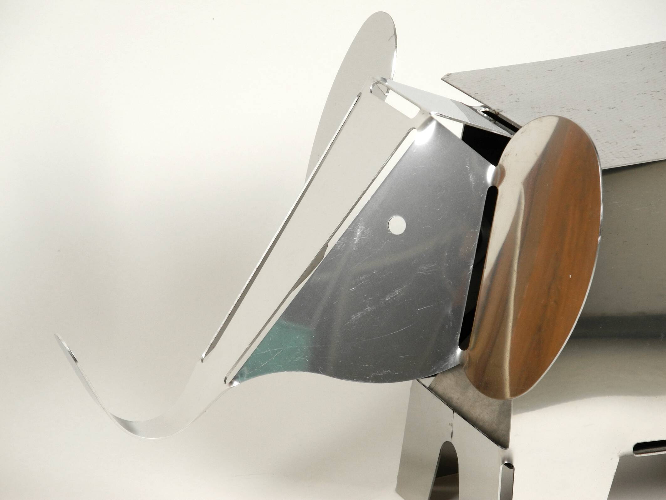 80s heavy metal chrome elephant floor lamp as side table Postmodern design