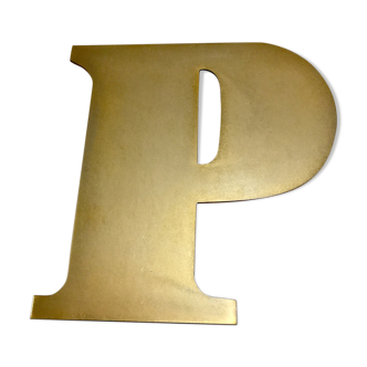 Old brass shop sign