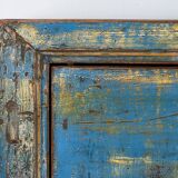Old wooden entrance buffet in blue and yellow tones (circa 1920).
