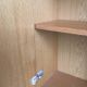 Dressing vintage Scandinavian style in light wood with wardrobe and cupboard.