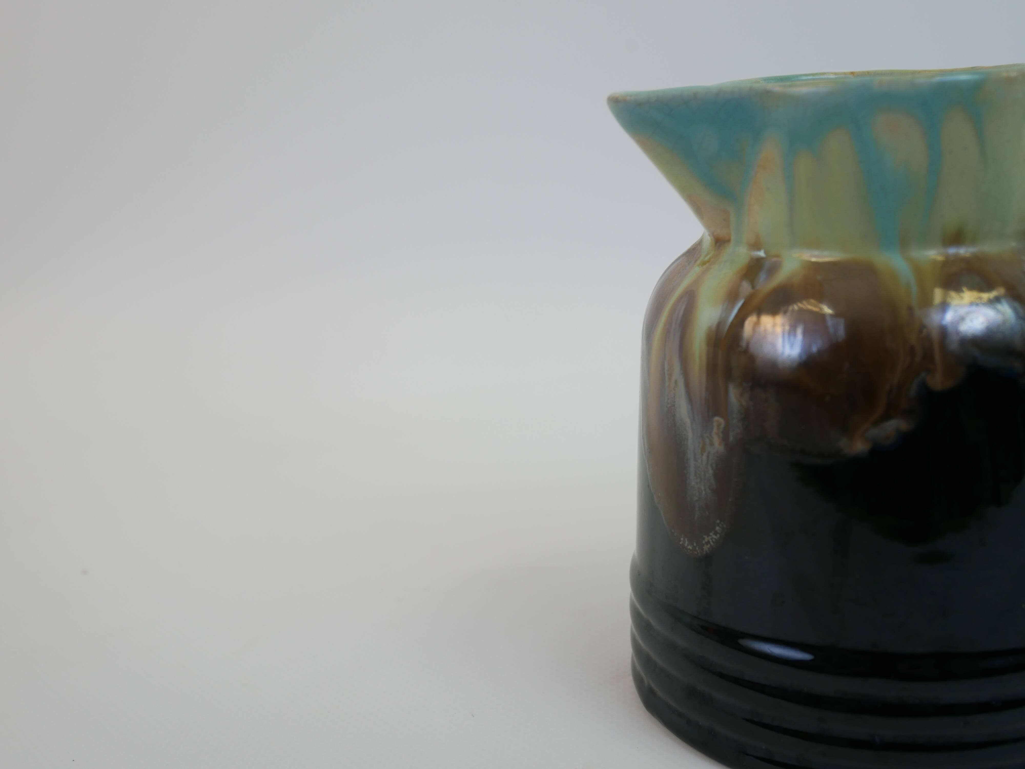 Art Deco pitcher in black, brown and blue glazed ceramic