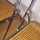 Pair of folding chairs in canning