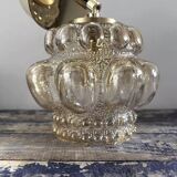 Gold tilting wall light