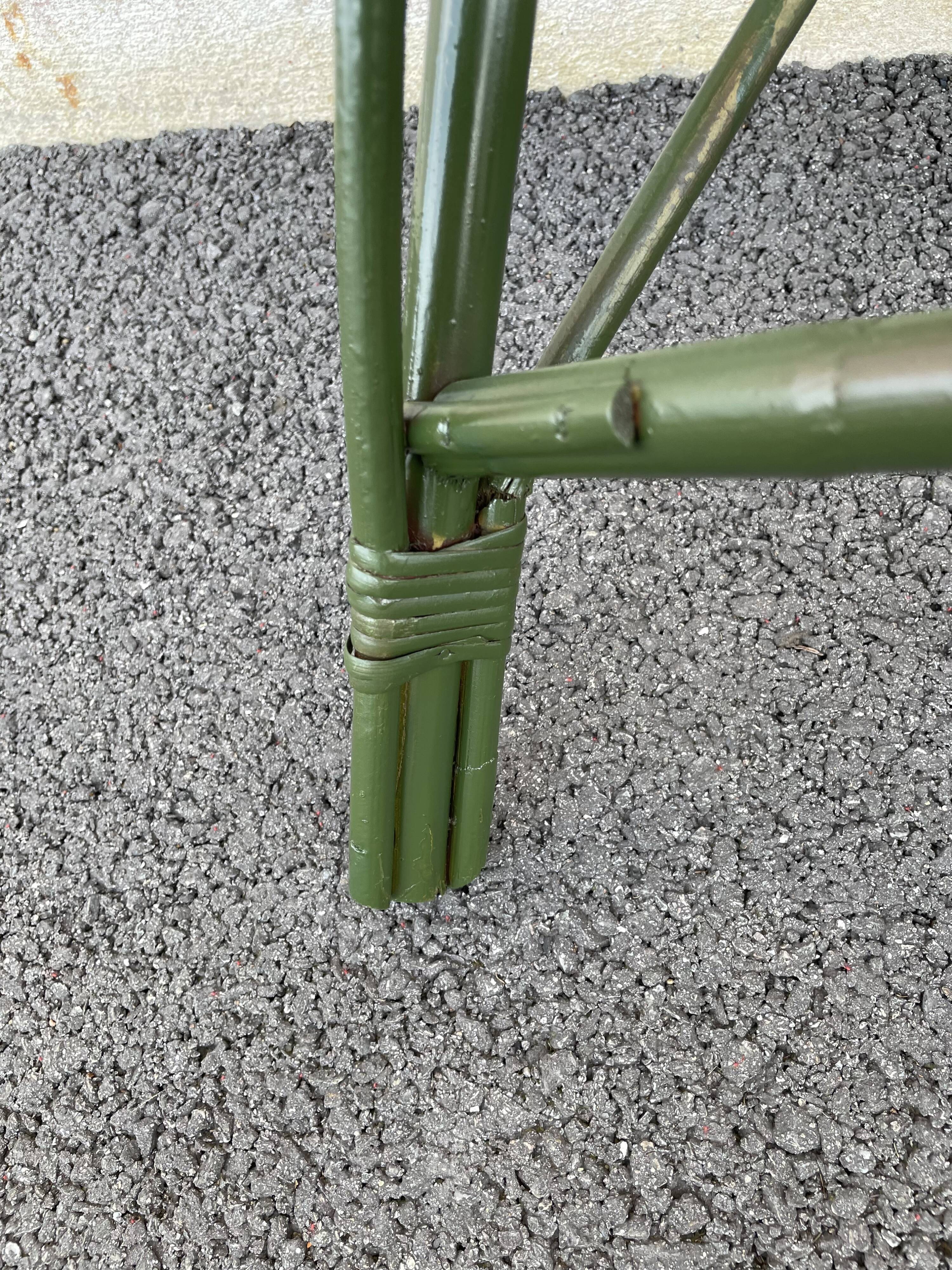 Green rattan armchair