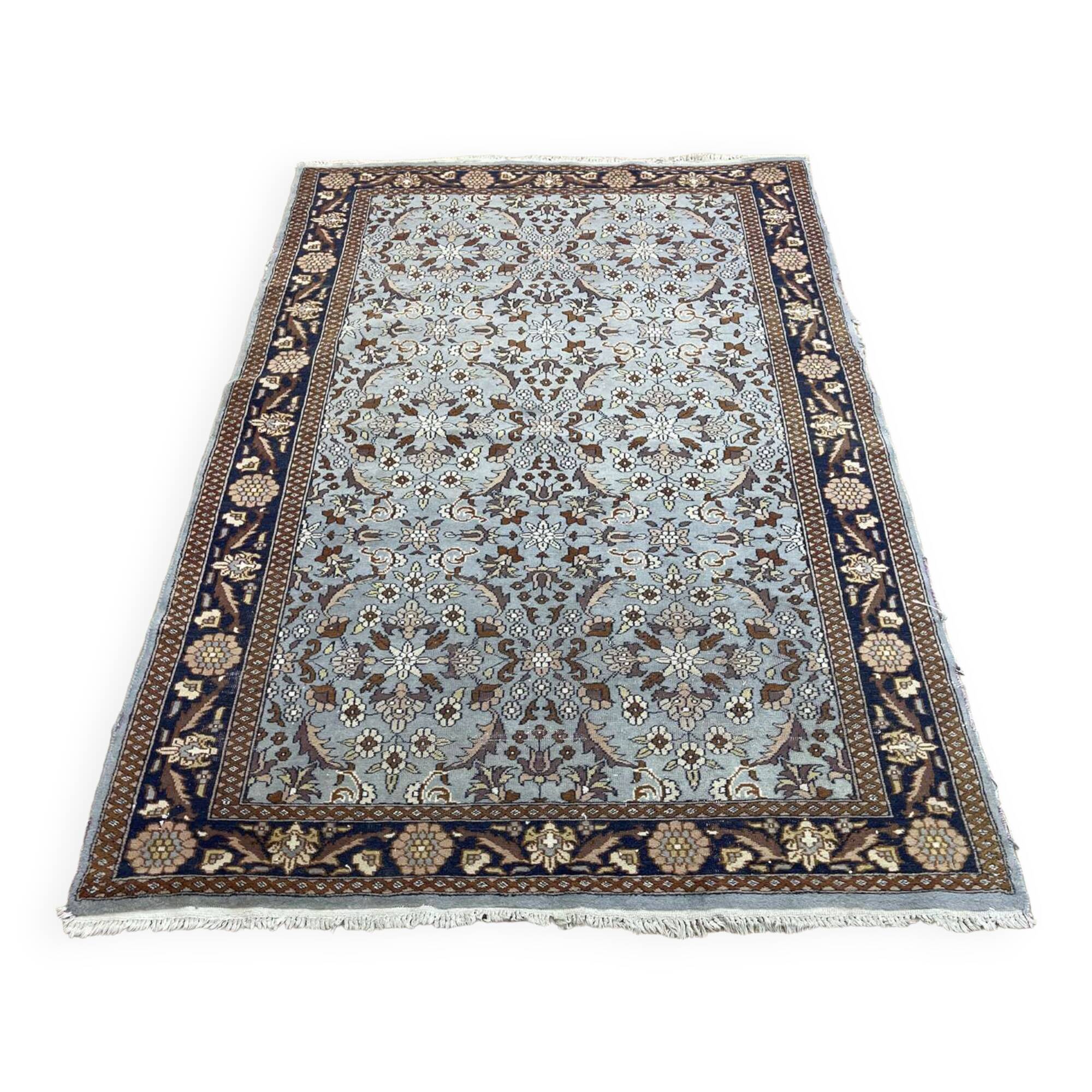 Handmade wool oriental carpet (wear defects)