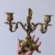 Pair of antique bronze candlesticks in the Louis XV rococo style