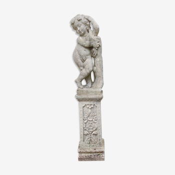 Ancient cherub statue in reconstituted stone