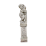 Ancient cherub statue in reconstituted stone