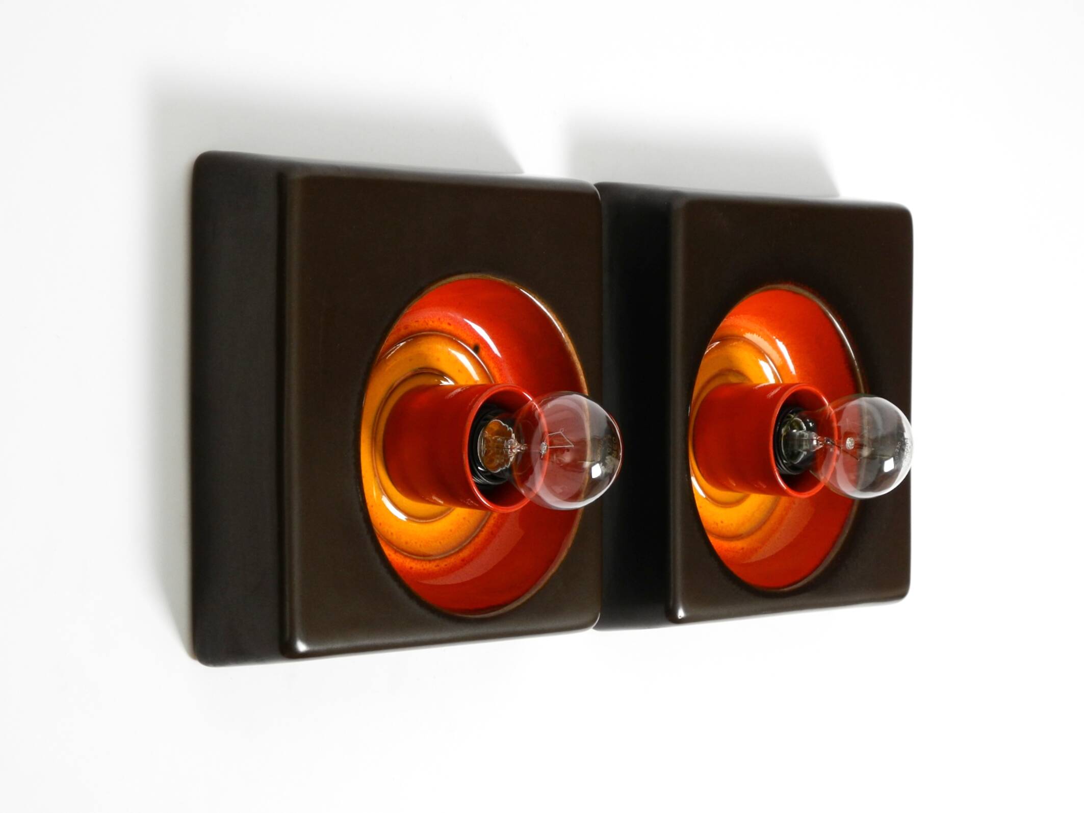 Two beautiful original 1970s Space Age ceramic wall lamps