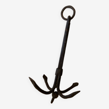 Old wrought iron marine anchor
