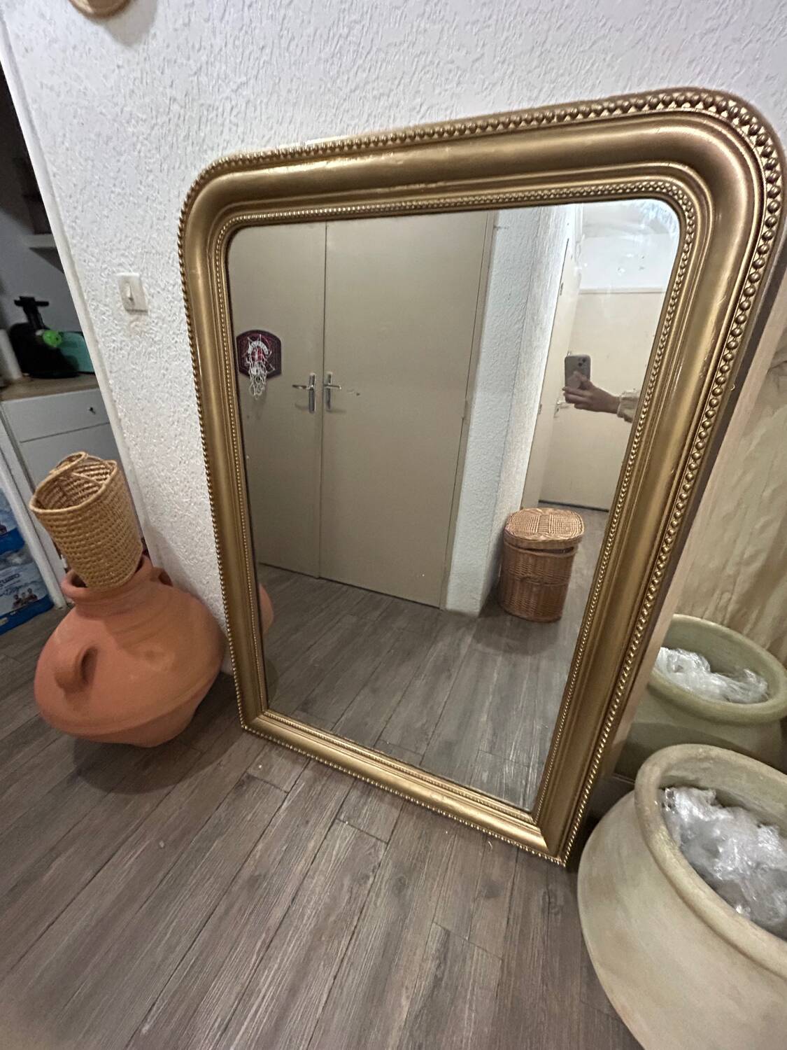 Antique gilded mirror in old Louis Philippe wood