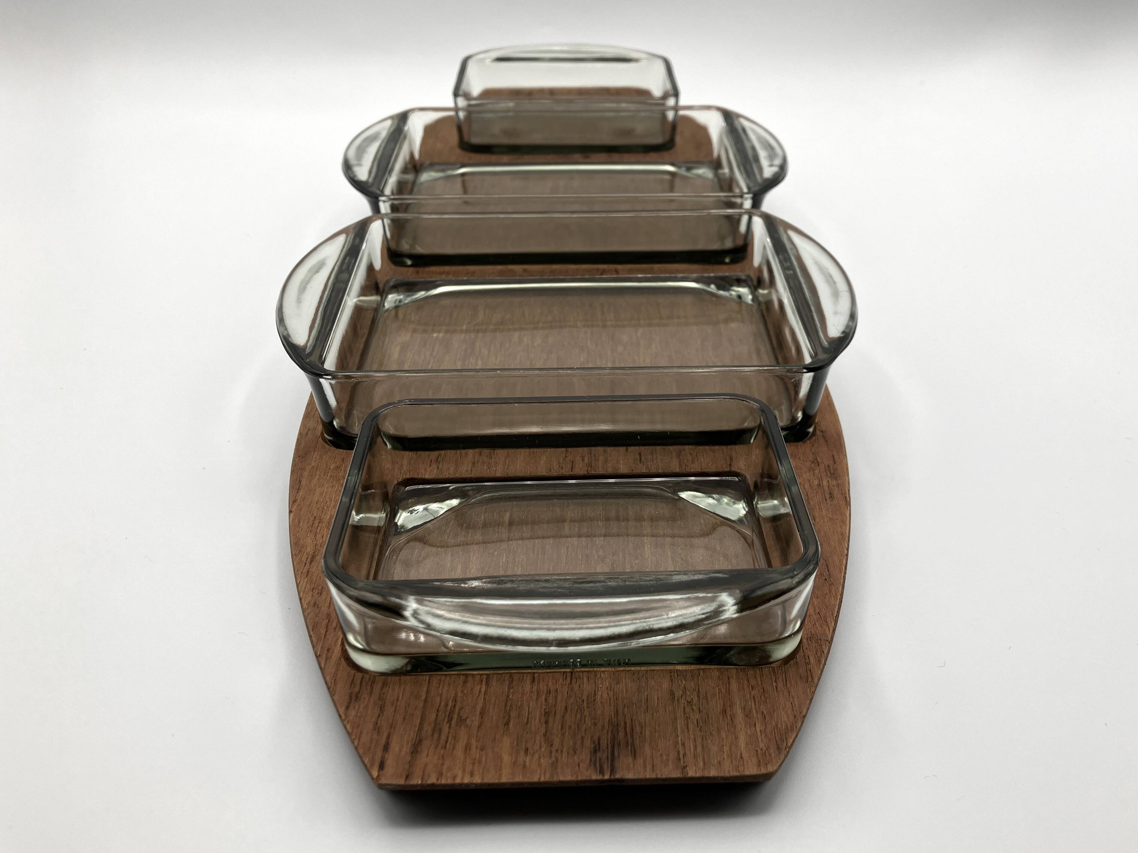 Teak tray and its 4 stackable glass dishes • Denmark • 1960