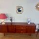 Scandinavian teak sideboard, 230 cm long, with 3 doors and 4 drawers.