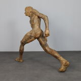 Life-size sculpture “Running Figure” by Karol Broniatowski, 1972