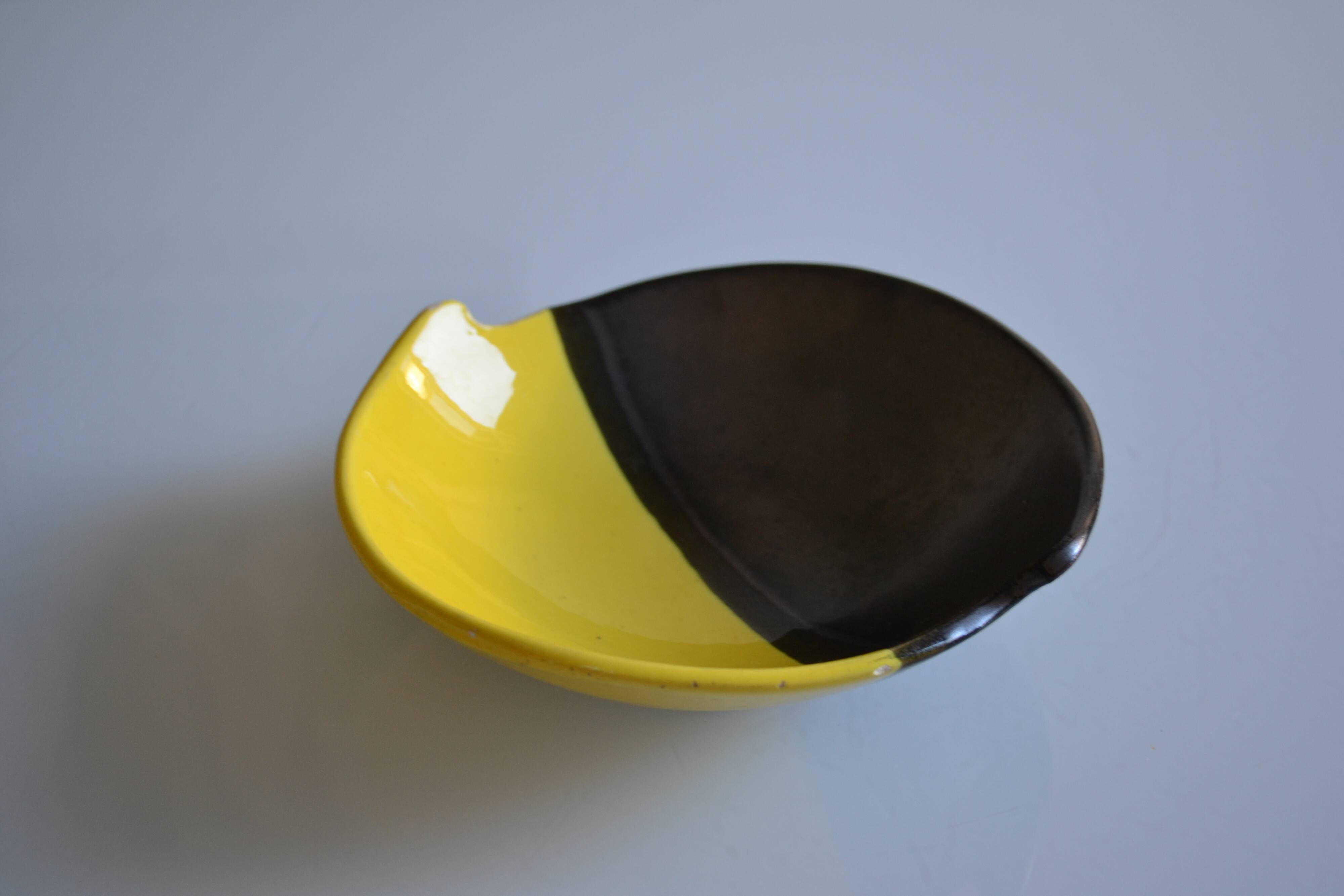 Bicolour ceramic cup in black and yellow signed Luc Vallauris 1950