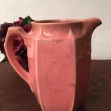 Old pitcher in earthenware of a very pretty pink
