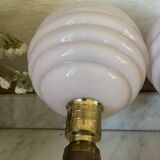 Pair of wall lights in wood, brass, and pink opaline.